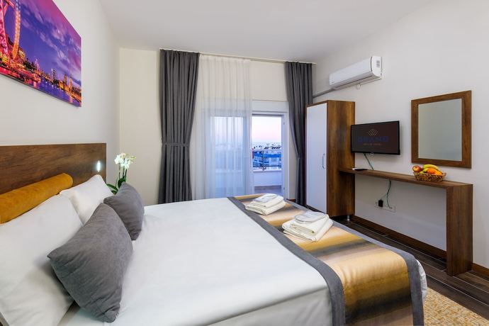 Imagen de la habitación del Grand Gulluk Hotel And Spa. Foto 11