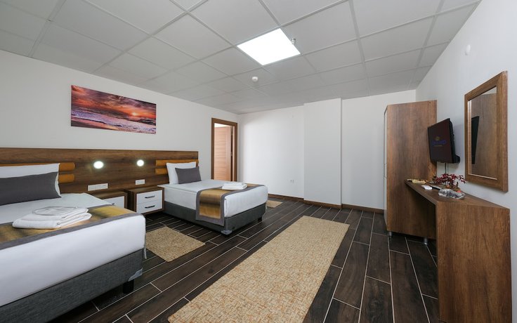 Imagen de la habitación del Grand Gulluk Hotel And Spa. Foto 12