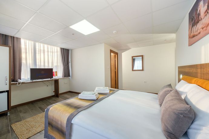 Imagen de la habitación del Grand Gulluk Hotel And Spa. Foto 15