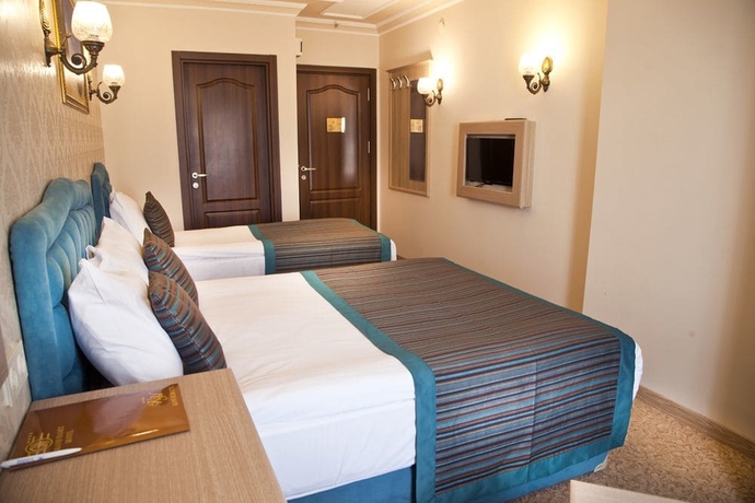 Imagen de la habitación del Grand Hamit Hotel. Foto 7