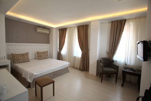 Imagen de la habitación del Grand Harsena Hotel. Foto 2