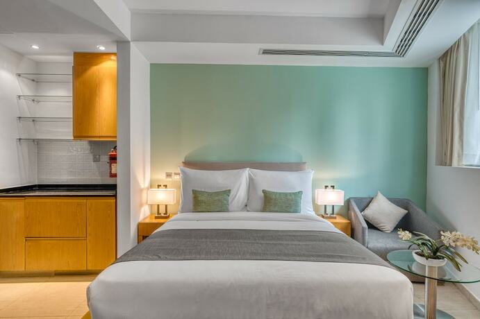 Imagen de la habitación del Grand Heights Hotel Apartments. Foto 16