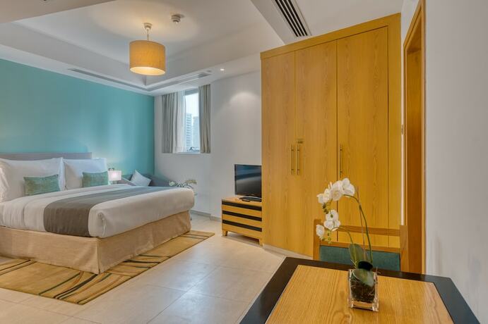 Imagen de la habitación del Grand Heights Hotel Apartments. Foto 17