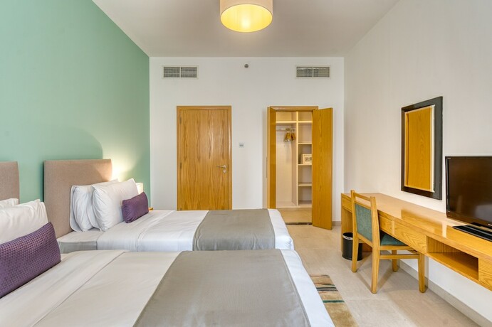 Imagen de la habitación del Grand Heights Hotel Apartments. Foto 18