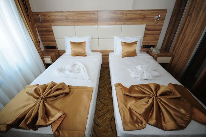 Imagen de la habitación del Grand Hekimoglu Hotel. Foto 9