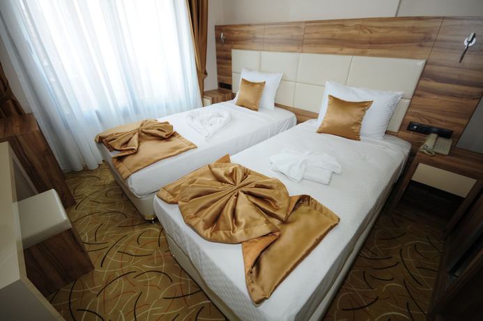 Imagen de la habitación del Grand Hekimoglu Hotel. Foto 12