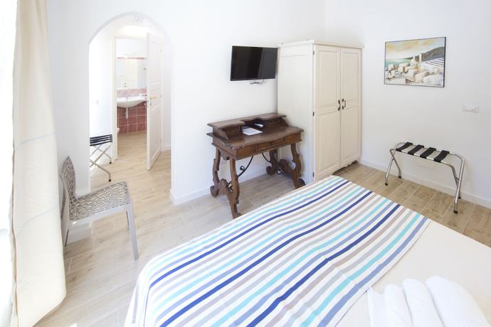 Imagen de la habitación del Grand Hotel Palau. Foto 16