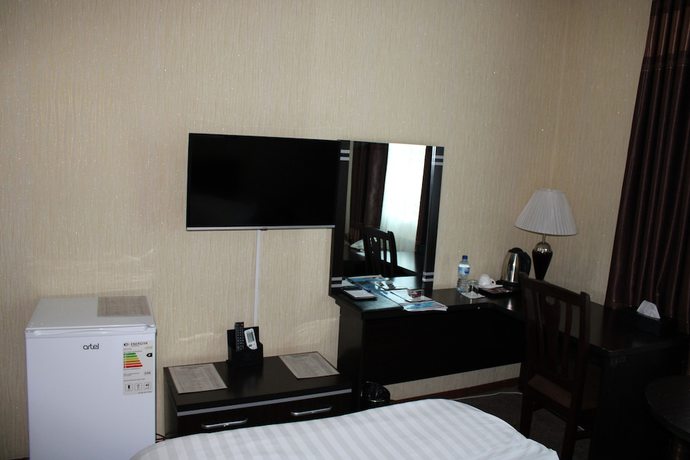 Imagen de la habitación del Grand Hotel Zarafshan. Foto 11