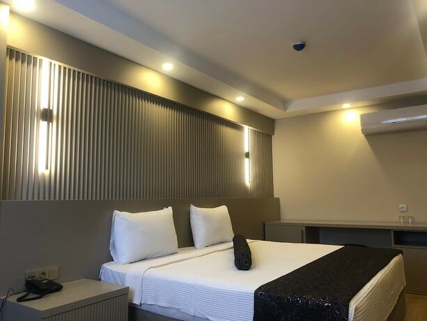 Imagen de la habitación del Grand Iska Hotel. Foto 14