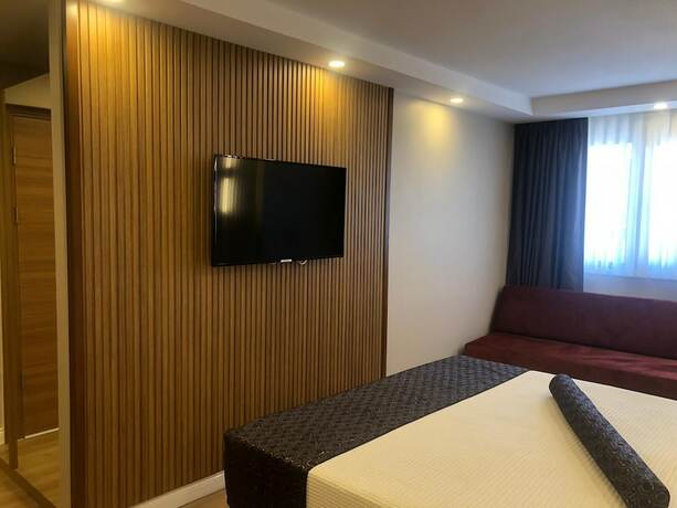 Imagen de la habitación del Grand Iska Hotel. Foto 15