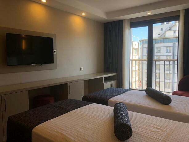 Imagen de la habitación del Grand Iska Hotel. Foto 16