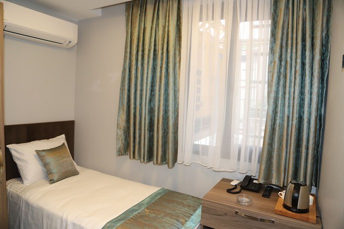 Imagen de la habitación del Grand Kavi Hotel. Foto 2