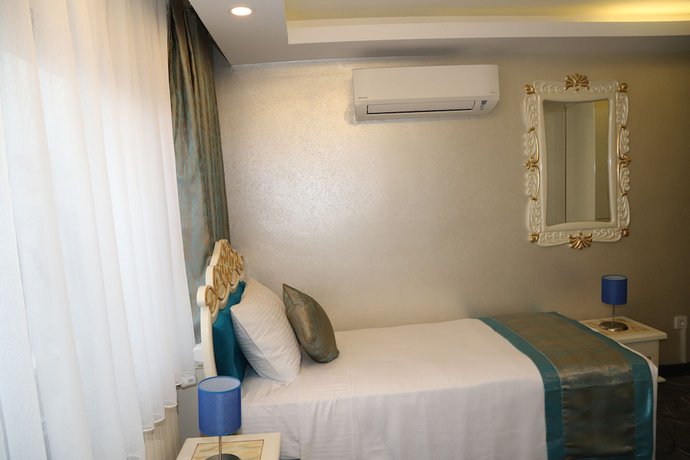 Imagen de la habitación del Grand Kavi Hotel. Foto 8