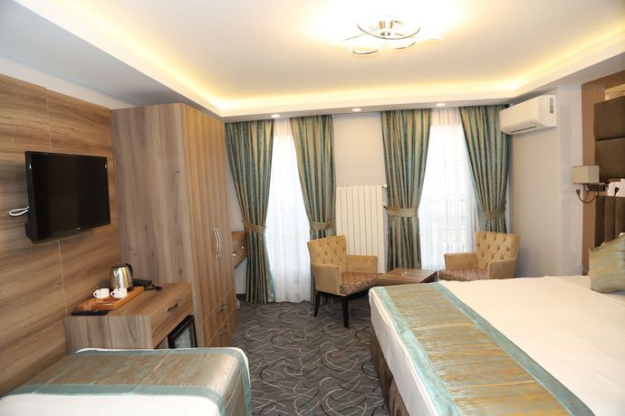 Imagen de la habitación del Grand Kavi Hotel. Foto 9