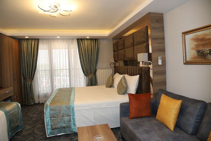 Imagen de la habitación del Grand Kavi Hotel. Foto 10