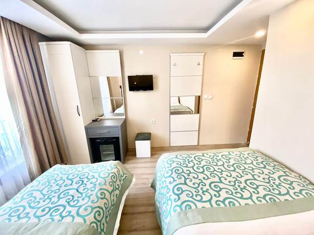 Imagen de la habitación del Grand Lara Hotel. Foto 4