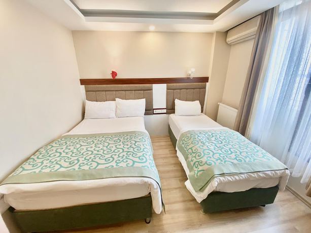 Imagen de la habitación del Grand Lara Hotel. Foto 5