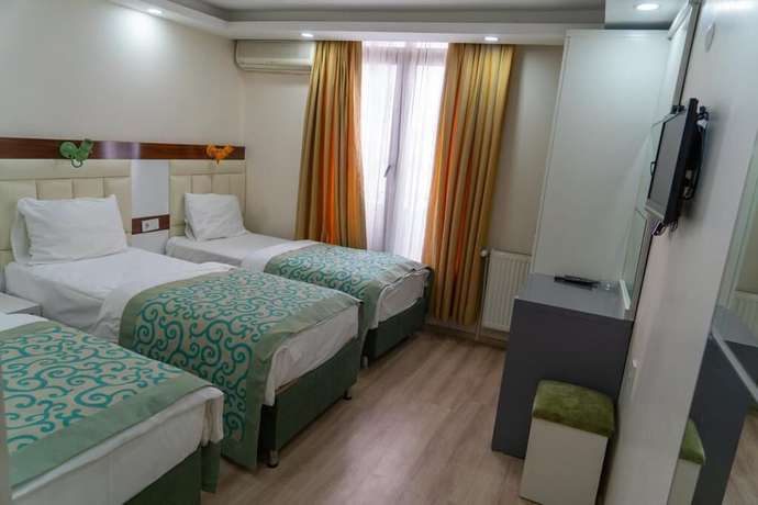 Imagen de la habitación del Grand Lara Hotel. Foto 9