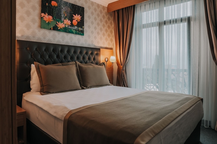 Imagen de la habitación del Grand Lark Otel. Foto 2