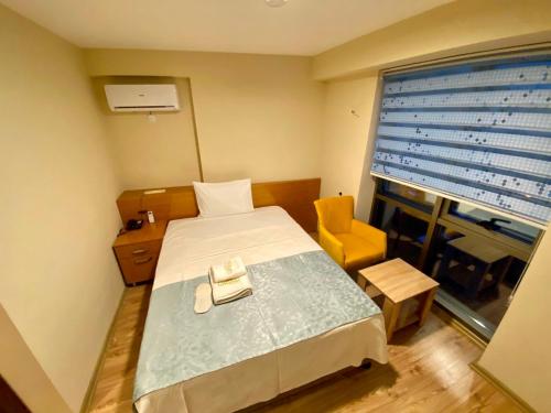 Imagen de la habitación del Grand Life Hotel. Foto 15