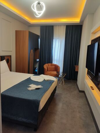 Imagen de la habitación del Grand Moon Hotel. Foto 14