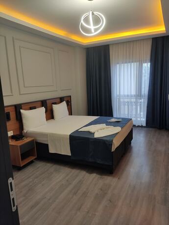 Imagen de la habitación del Grand Moon Hotel. Foto 18
