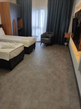 Imagen de la habitación del Grand Moon Hotel. Foto 20