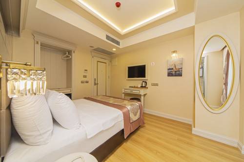 Imagen de la habitación del Grand Naki Hotel. Foto 2