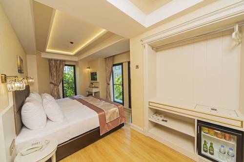 Imagen de la habitación del Grand Naki Hotel. Foto 5