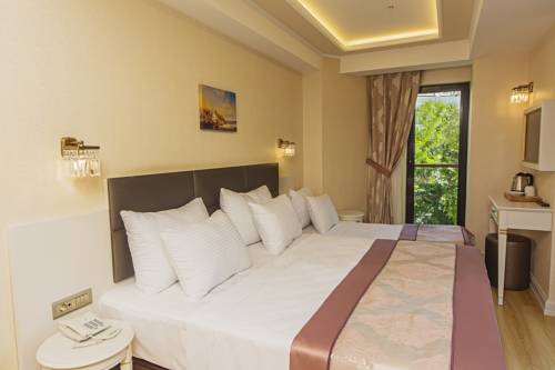 Imagen de la habitación del Grand Naki Hotel. Foto 6