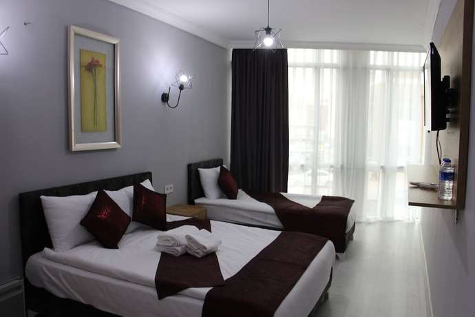 Imagen de la habitación del Grand Niki Hotel and Spa. Foto 8