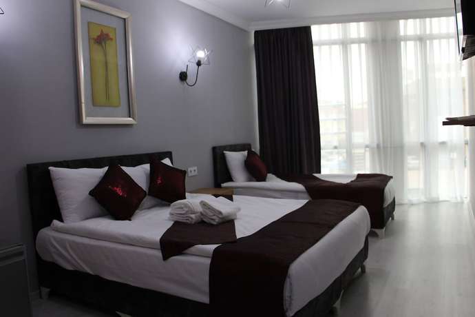 Imagen de la habitación del Grand Niki Hotel and Spa. Foto 10