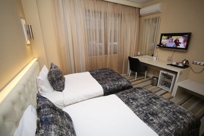 Imagen de la habitación del Grand Nora Hotel. Foto 9