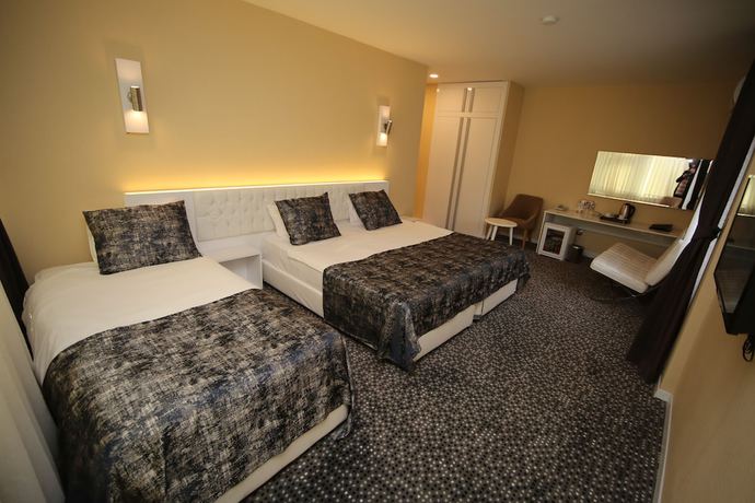Imagen de la habitación del Grand Nora Hotel. Foto 13