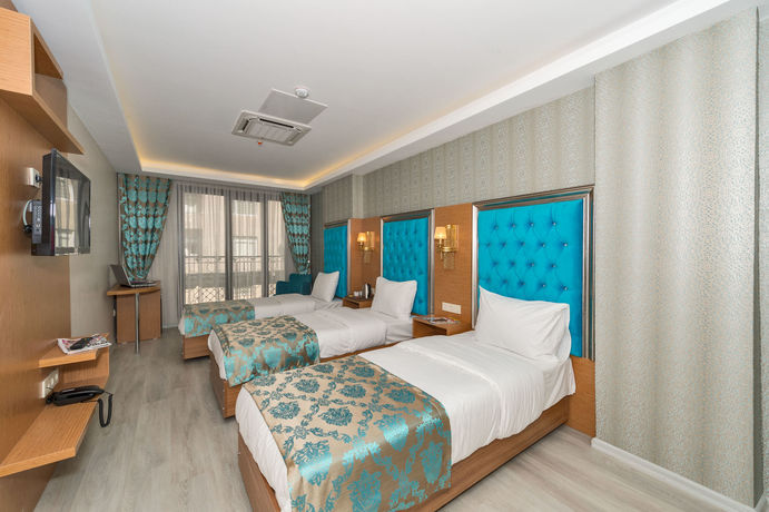 Imagen de la habitación del Grand Palace Hotel. Foto 2