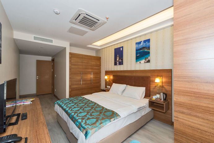 Imagen de la habitación del Grand Palace Hotel. Foto 4