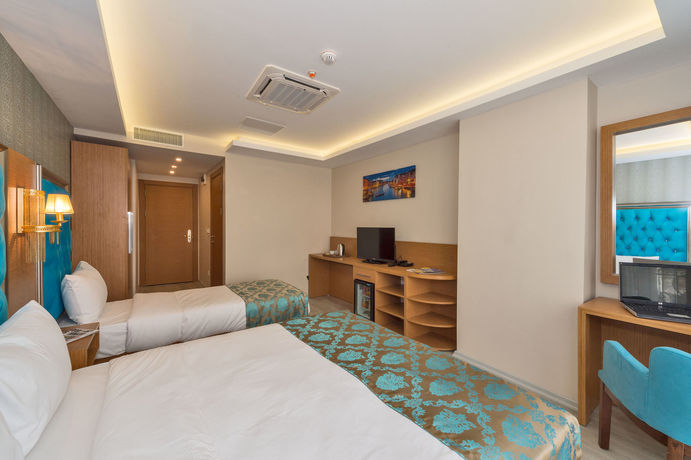 Imagen de la habitación del Grand Palace Hotel. Foto 5