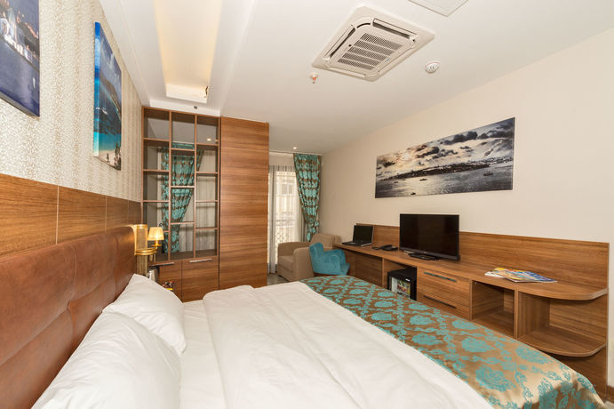 Imagen de la habitación del Grand Palace Hotel. Foto 6