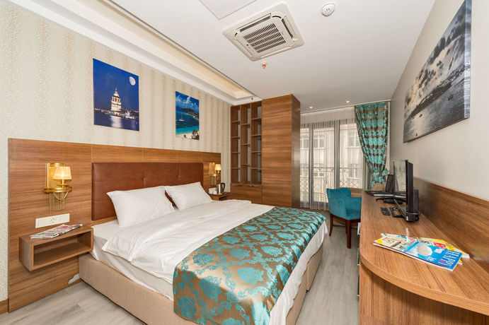 Imagen de la habitación del Grand Palace Hotel. Foto 7