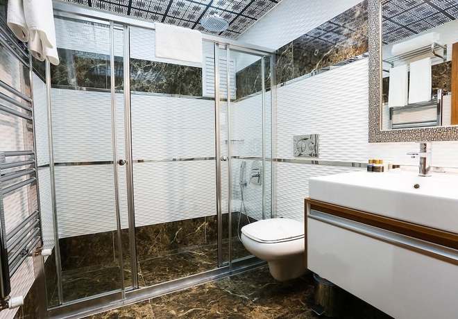 Imagen de la habitación del Grand Pasabey Otel. Foto 9