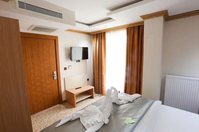 Imagen de la habitación del Grand Pasabey Otel. Foto 11