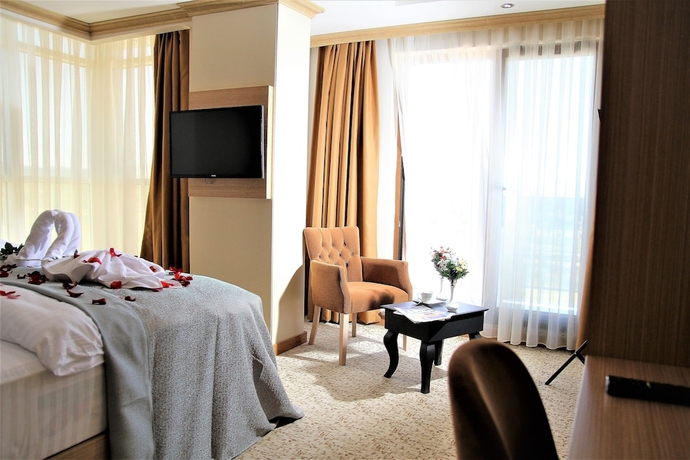 Imagen de la habitación del Grand Pasabey Otel. Foto 13