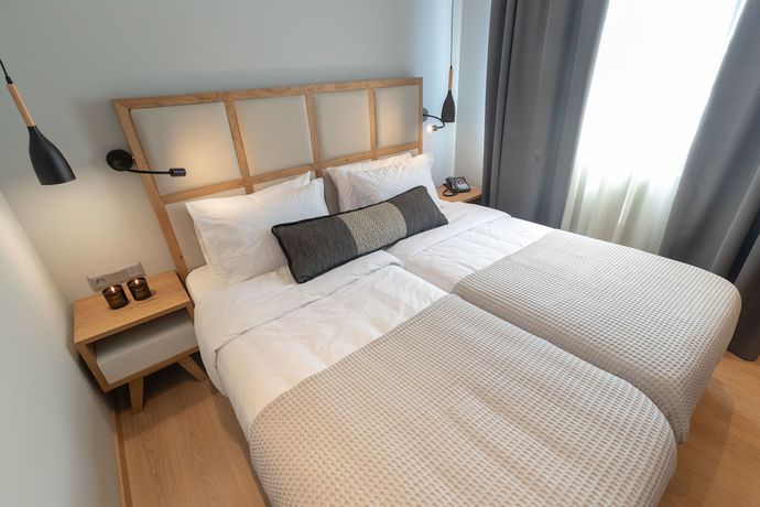 Imagen de la habitación del Grand Port Suites Thessaloniki. Foto 3