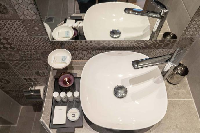 Imagen de la habitación del Grand Port Suites Thessaloniki. Foto 6