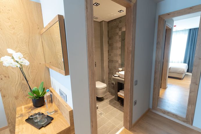 Imagen de la habitación del Grand Port Suites Thessaloniki. Foto 8