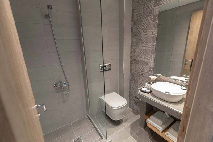 Imagen de la habitación del Grand Port Suites Thessaloniki. Foto 10