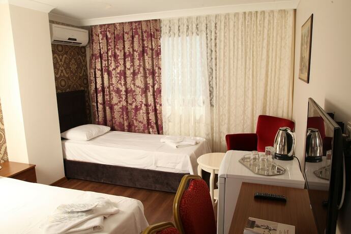 Imagen de la habitación del Grand Safir Hotel. Foto 13