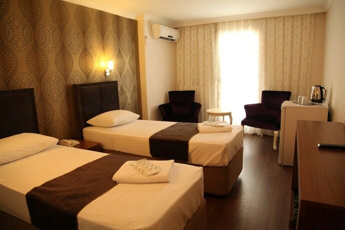 Imagen de la habitación del Grand Safir Hotel. Foto 15