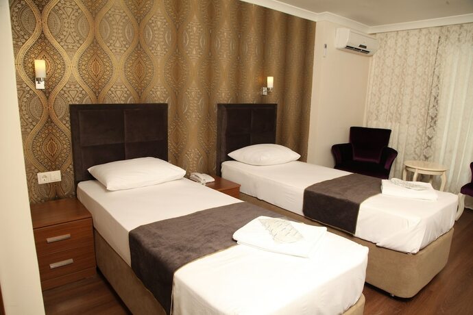 Imagen de la habitación del Grand Safir Hotel. Foto 16