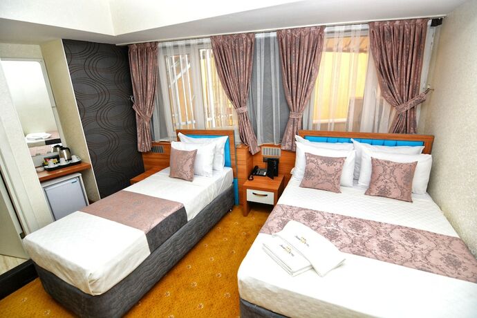 Imagen de la habitación del Grand Sah Otel. Foto 17